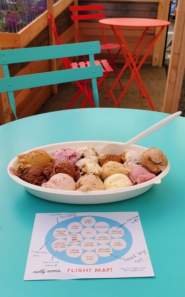 An ice cream tasting flight with 14 mini ice cream scoops at Molly Moon's in Seattle, Washington