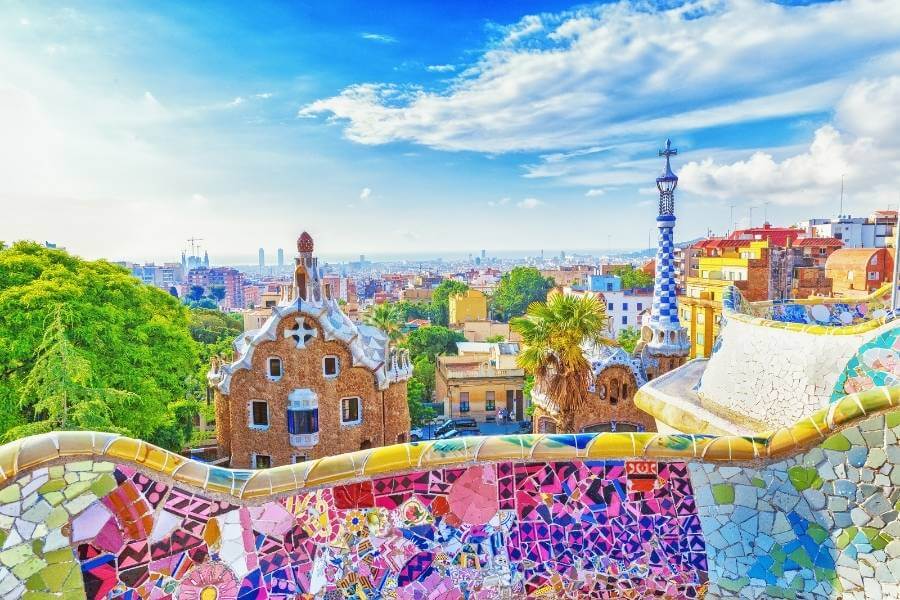 A view of a famous, colorful bench at Park Güell in Barcelona Spain