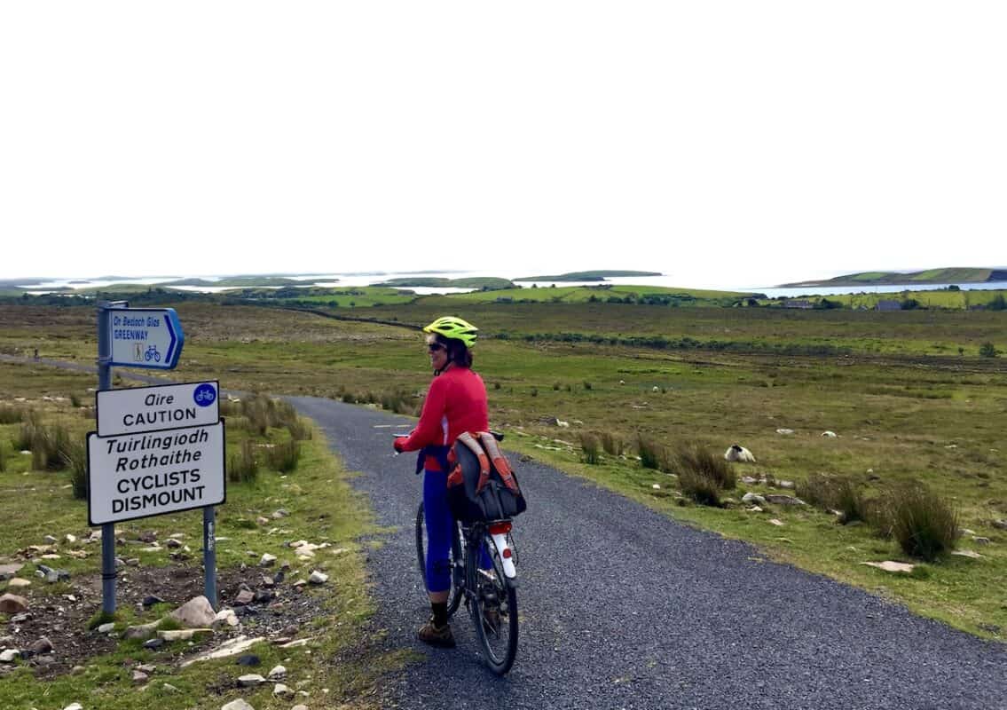 A cyclist on the path of the Great Western Greenway near County Mayo, Ireland